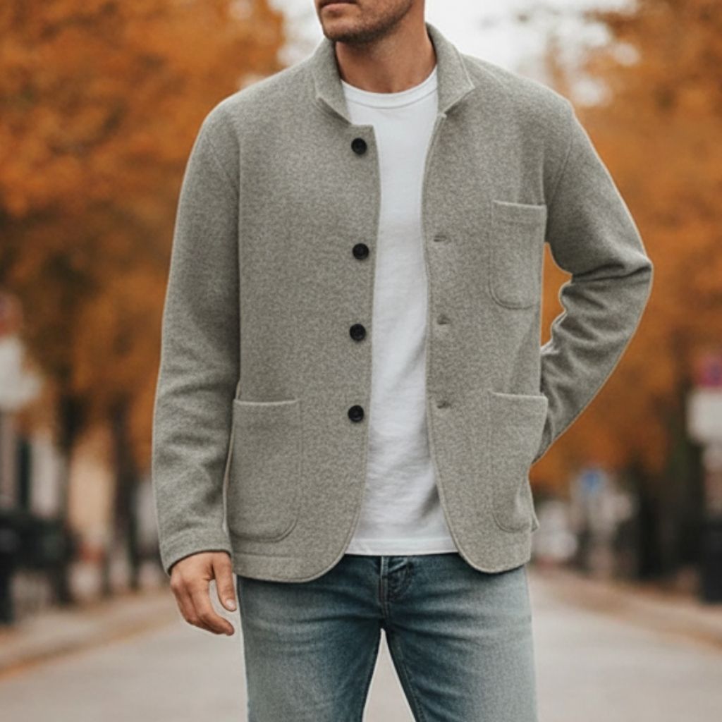front view of buttoned wool knit showing collar and pocket design
