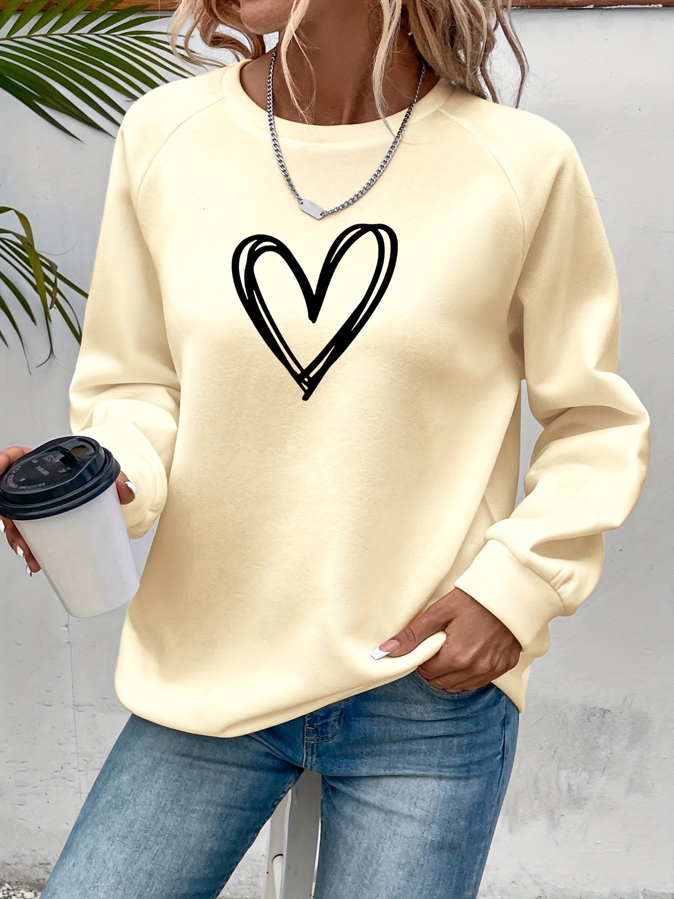 Cozy Fleece-Lined Women's Heart Print Sweatshirt - Casual Long Sleeve Crew Neck Pullover, Perfect for Fall & Winter, Machine Washable, Grey with Black Heart Design