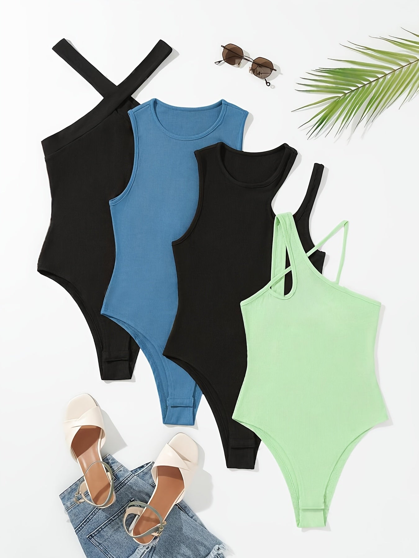 A Four-Piece Women'S Casual Fashion Set Featuring a Sleeveless Round-Neck Cross-Strap Tank Top, Irregular Solid Color, Soft And Comfortable, Fitted with Small Ribbed Bodysuit Top.