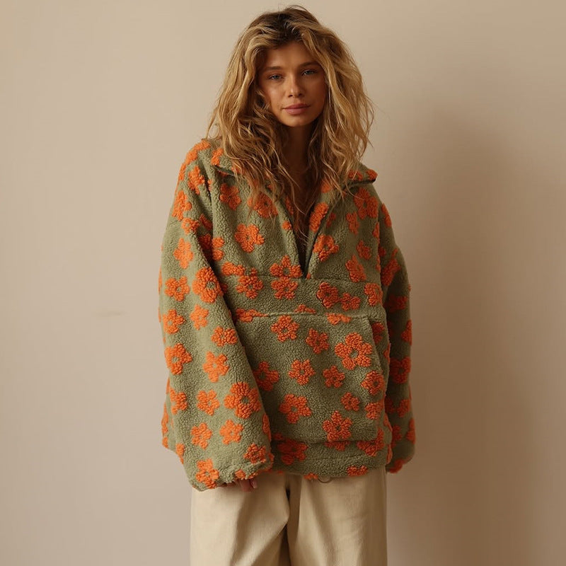 Cosy sherpa fleece pullover with stand collar and partial zip closure
